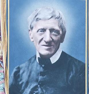 Tapís amb el rostre de Newman a la façana de Sant Pere el dia de la seva canonització, el 10 d’octubre de 2019 (©Catholic Press Photo)